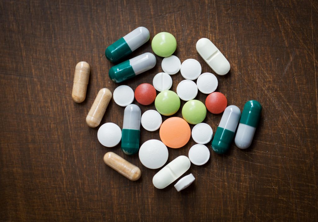 Pile of pills for Hormone Therapy in Palm Beach Gardens